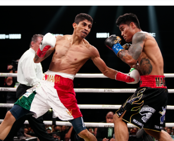 Rey-Vargas-Survives-a-Scare-to-Win-Mark-Magsayo's-Featherweight-Title
