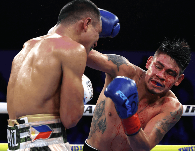 Emanuel-Navarrete-Survives-a-Bloody-Battle-with-Charly-Suarez-in-San-Diego